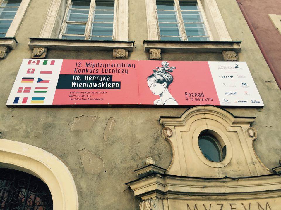 Banner with graphics designed by Andrzej Pągowski hanging on a building of Museum of Musical Instruments in Poznań (06.05.2016)